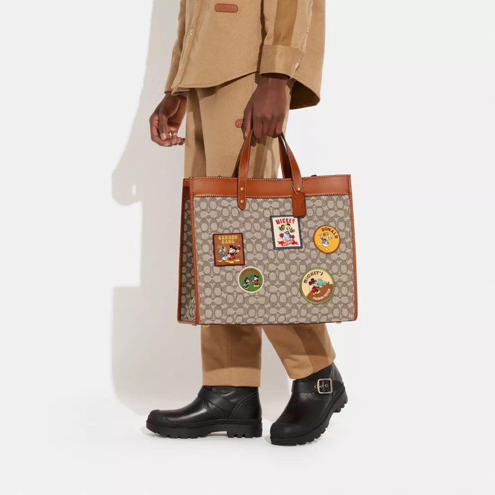 DISNEY X COACH FIELD TOTE 40 IN SIGNATURE TEXTILE JACQUARD WITH PATCHES 7 DISNEY X COACH FIELD TOTE 40 IN SIGNATURE TEXTILE JACQUARD WITH PATCHES - Image 5